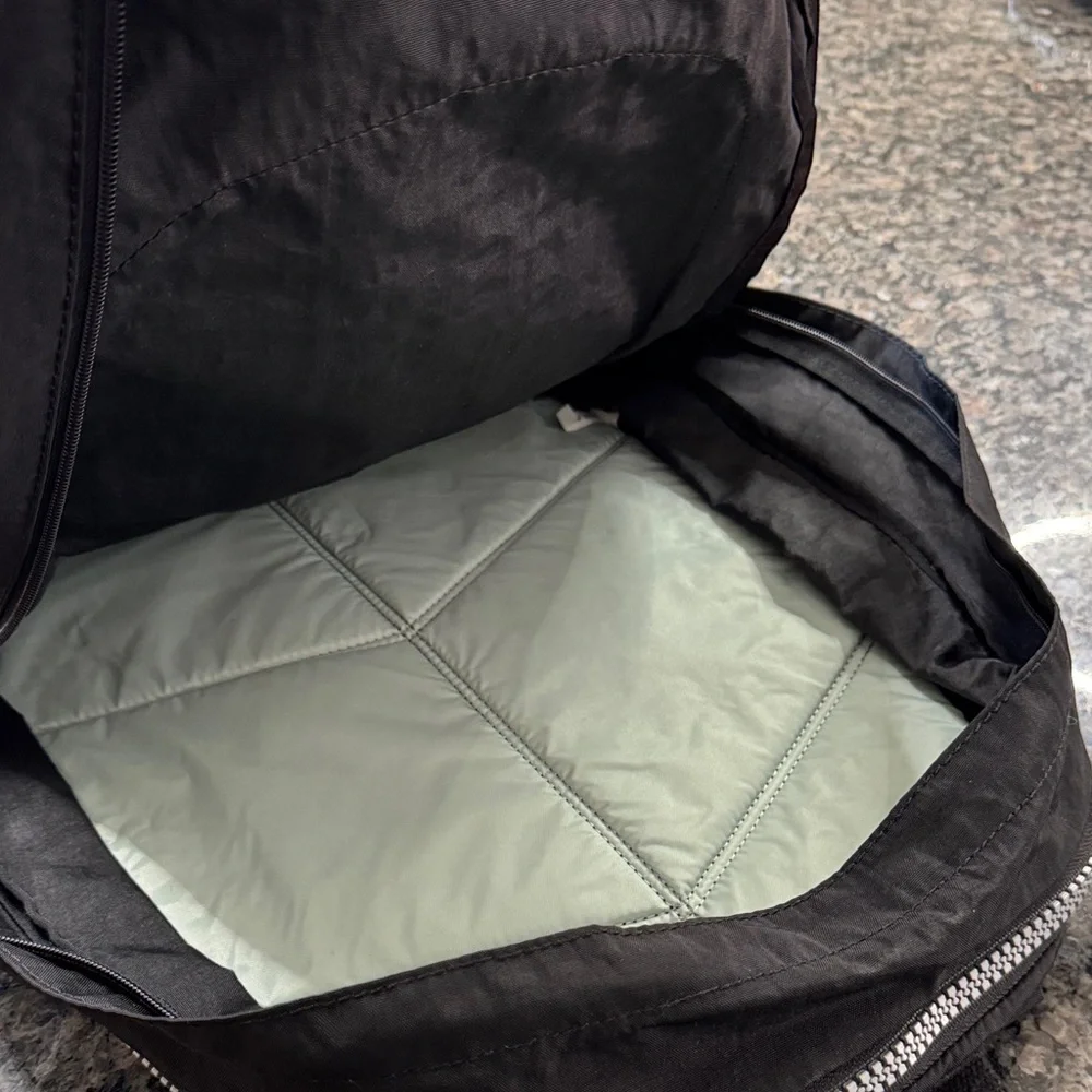 Kipling Hal Expandable Black Backpack with large Silver Accent zippers EUC